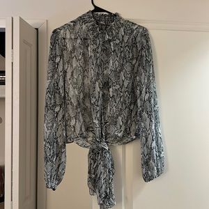Turtle neck snakeskin pattern blouse